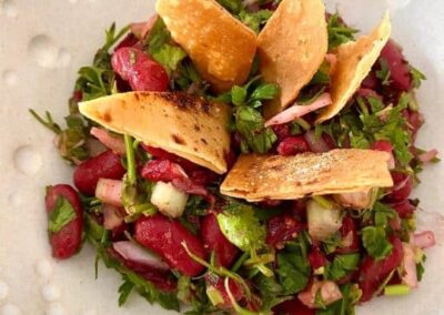 Kidney bean salad with a warm spice dressing and chapati chips